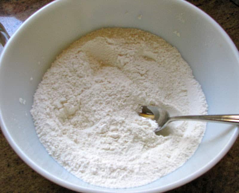 bowl with dry ingredients and a spoon