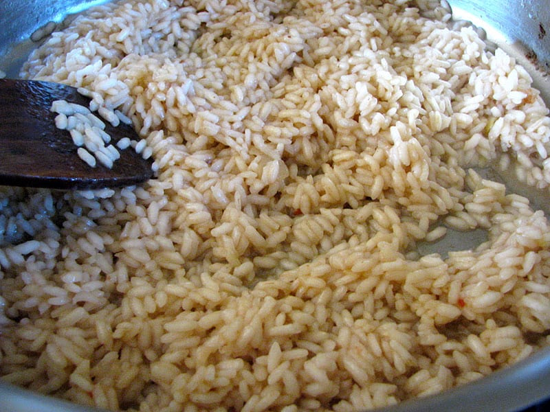 stirring the rice