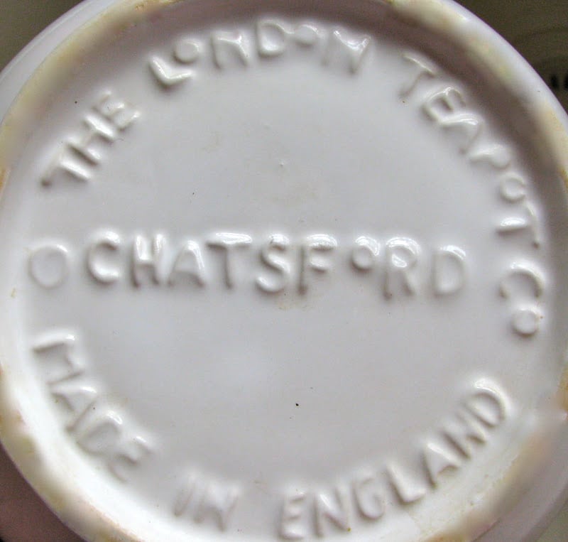 bottom of a teapot with THE LONDON TEAPOT CO MADE IN ENGLAND, CHATSFORD text on bottom