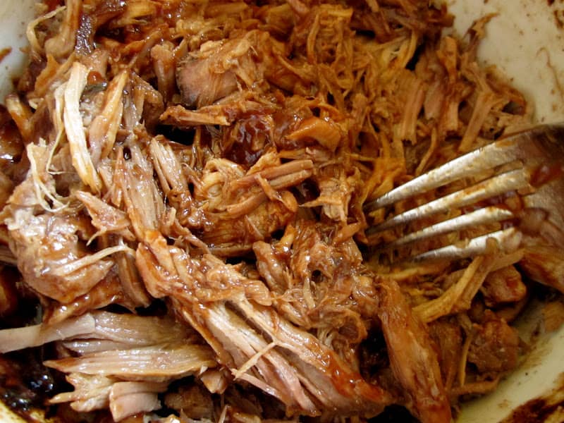 forking the slow cooker pulled pork 