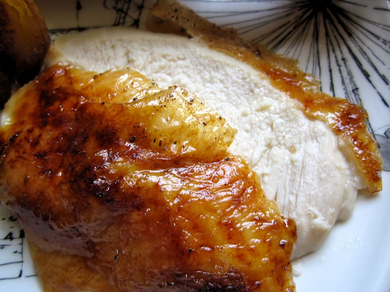 cut piece of rosemary citrus roast chicken