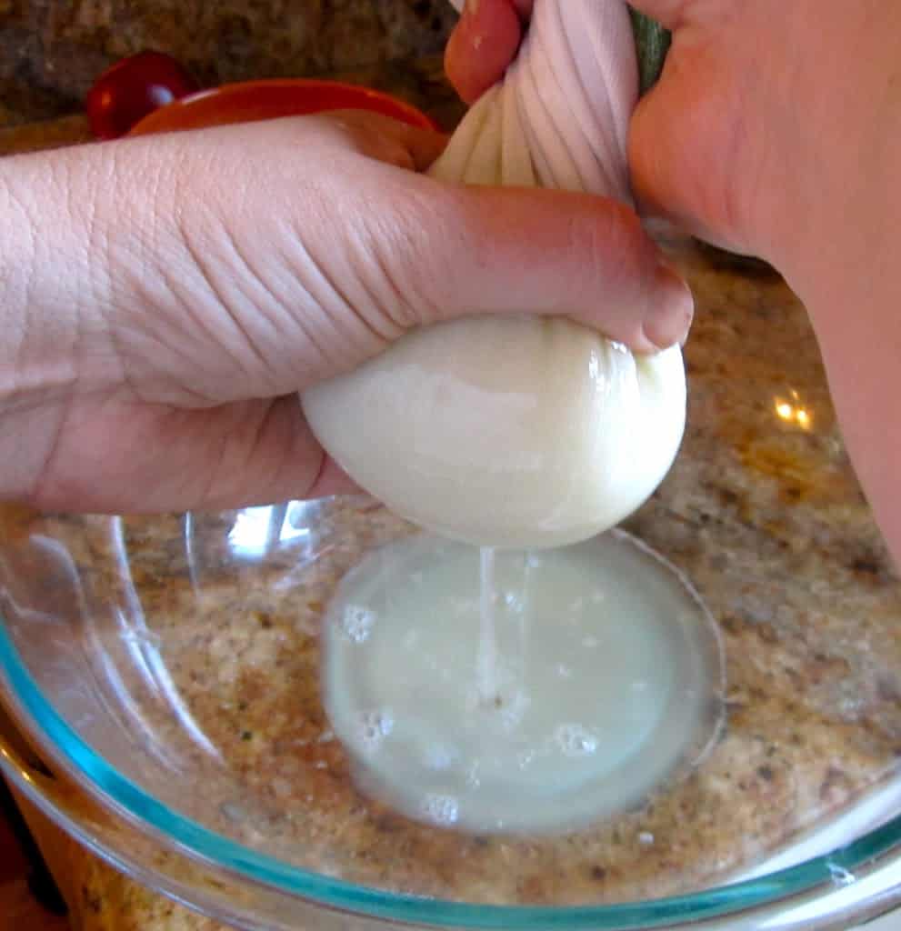 squeezing liquid from the onions