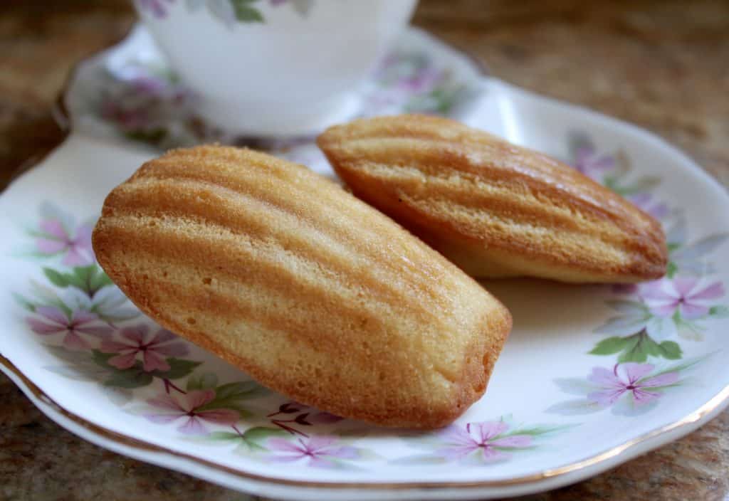 madeleines on a saucer with tea
