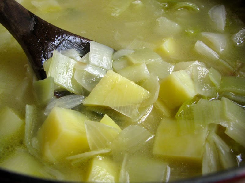 stirring leek and potato soup