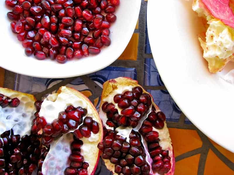 Can opener and pomegranate - open pomegranate for juice Stock Photo