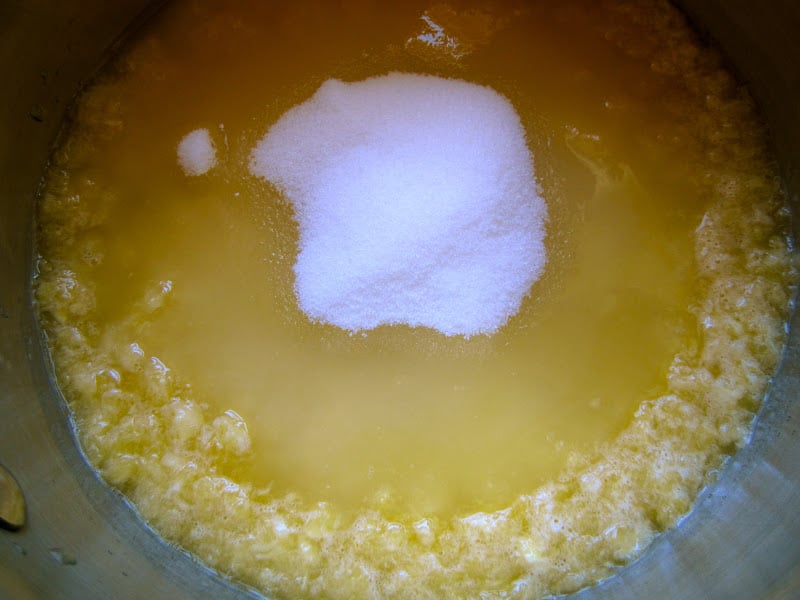 orange and sugar in a pot