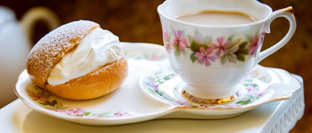 scottish cream bun with cup of tea