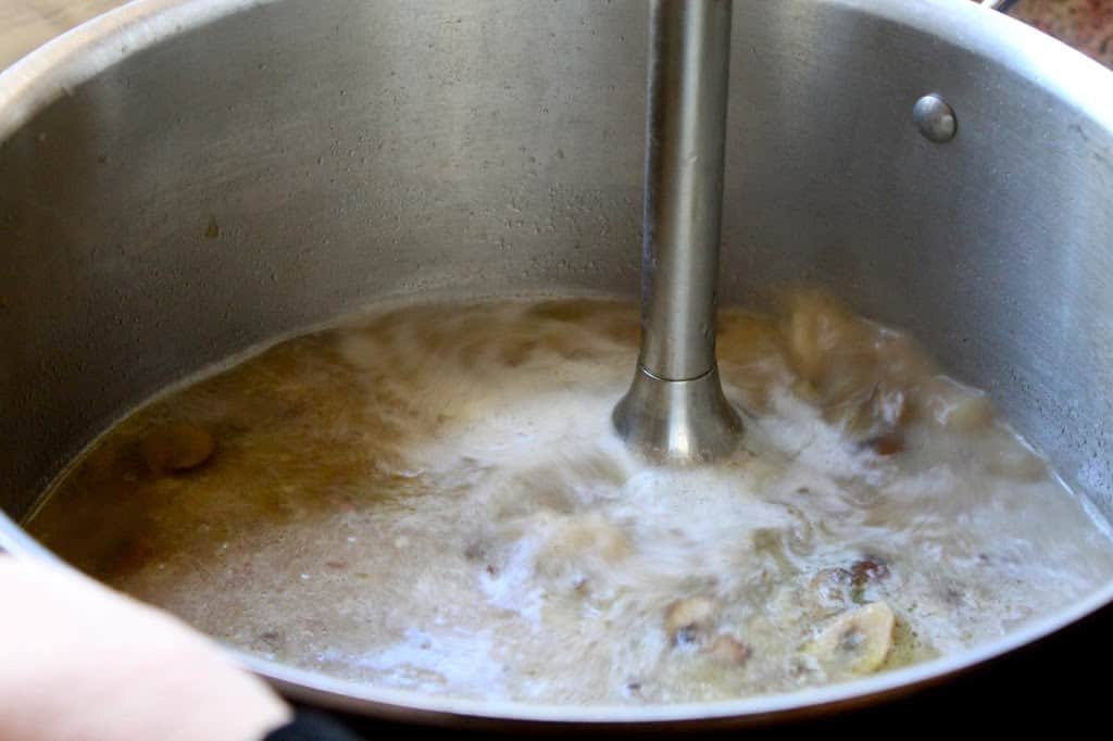 blending mushroom soup in a pot