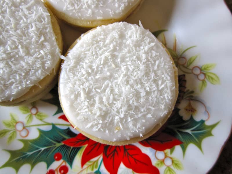 overhead shot of snow cookies on a plate