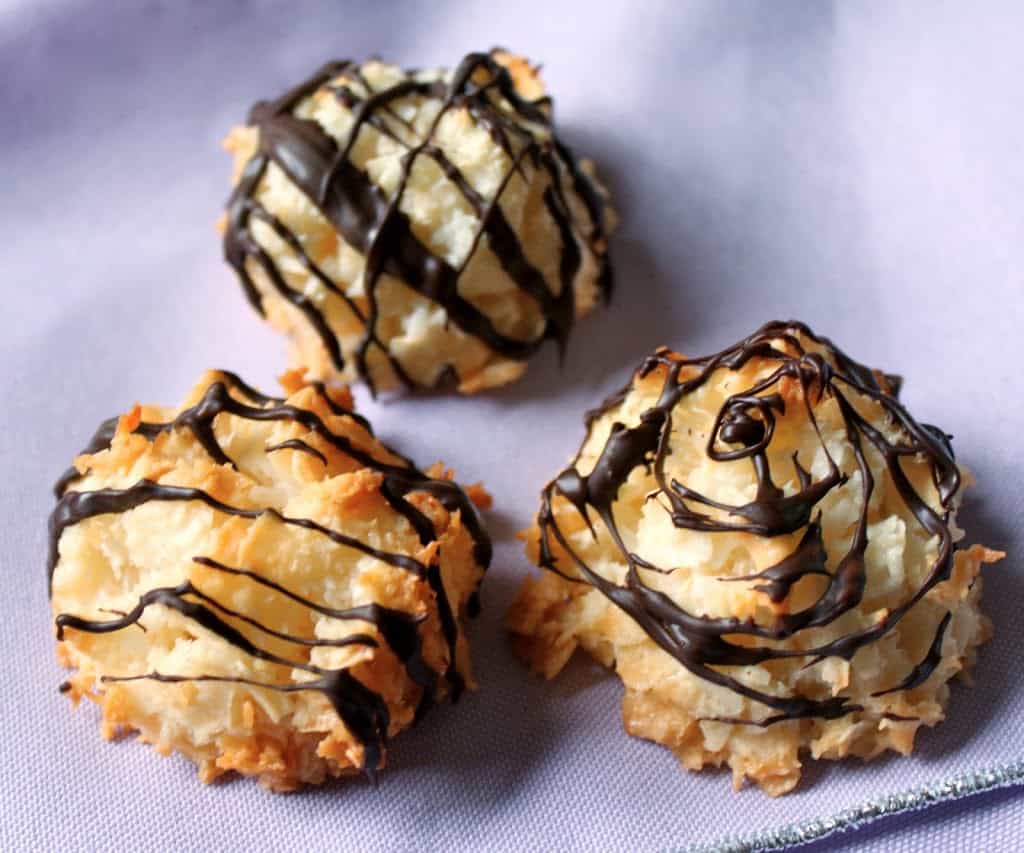 coconut macaroons decorated with melted chocolate