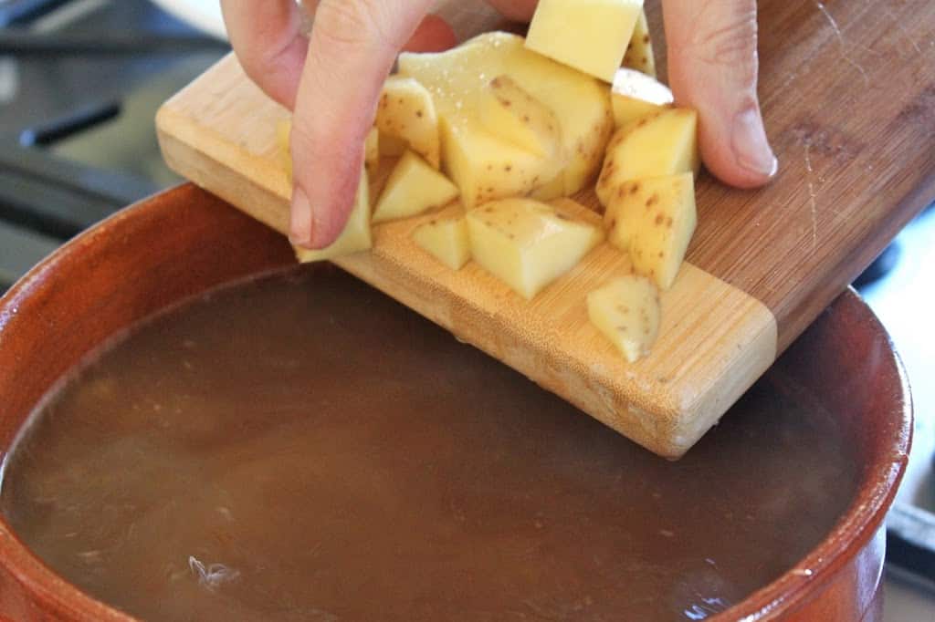 adding potatoes to doenjang jjigae