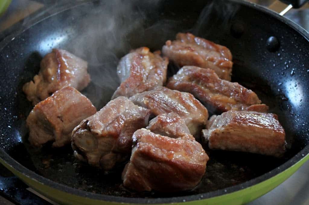 pork in a frying pan