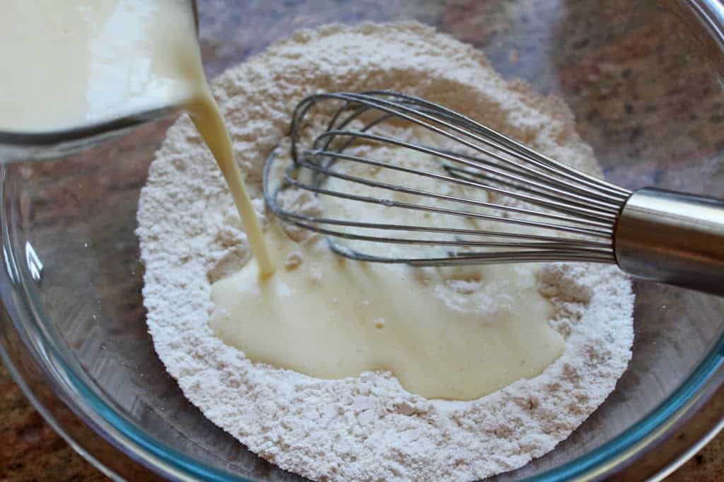 mixing ingredients for buttermilk pancakes