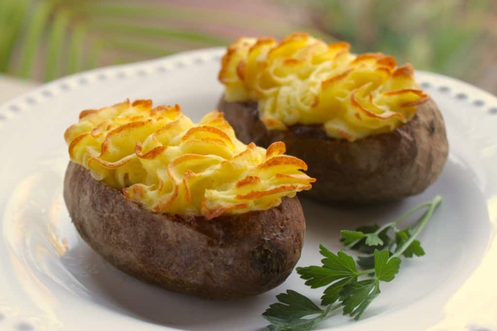 shepherd's pie baked potatoes on a plate