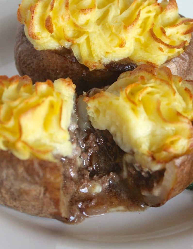 Cottage shepherd's Pies in baked potatoes cut open
