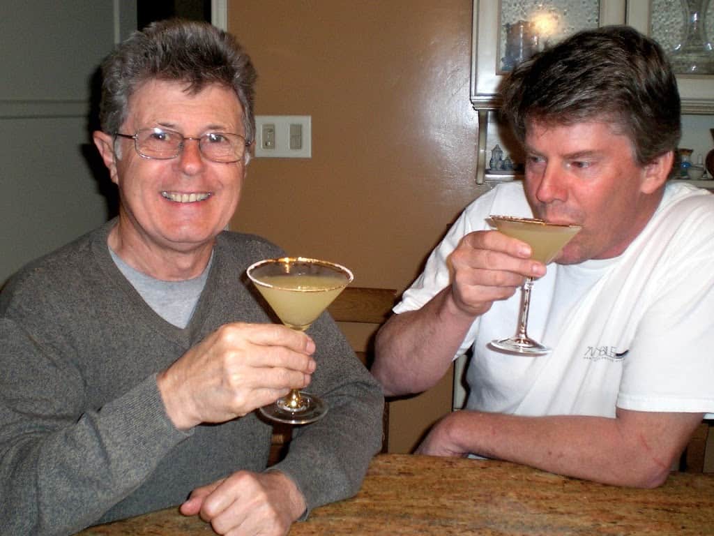 two men enjoying a cocktail