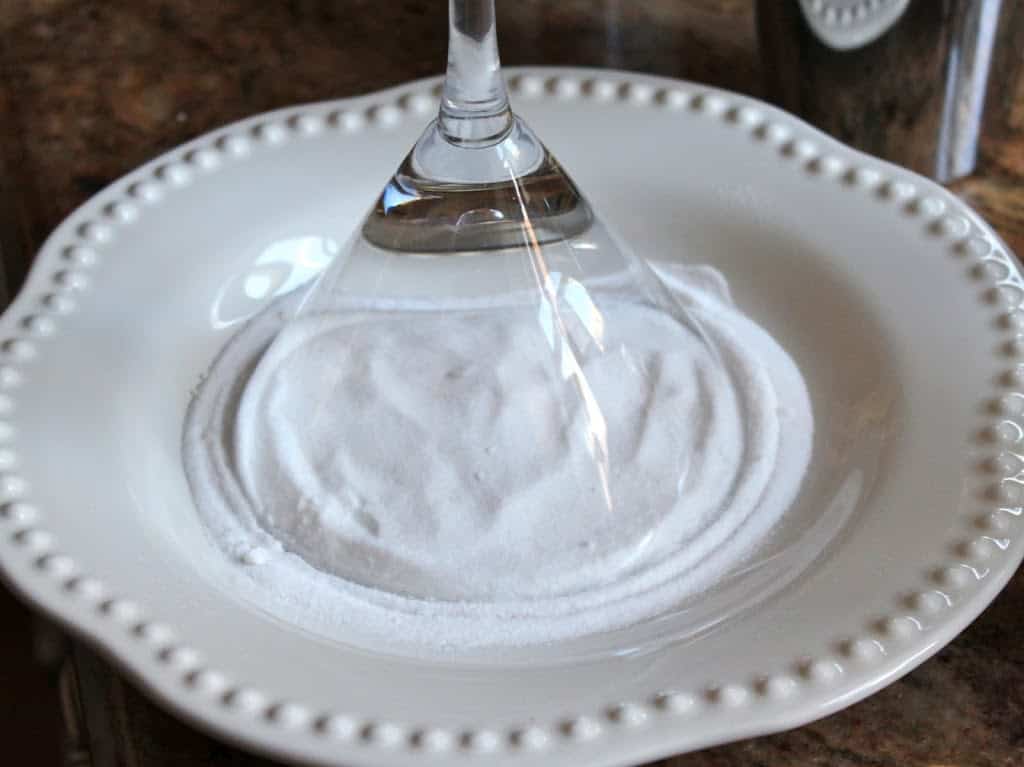 rimming a martini glass with sugar