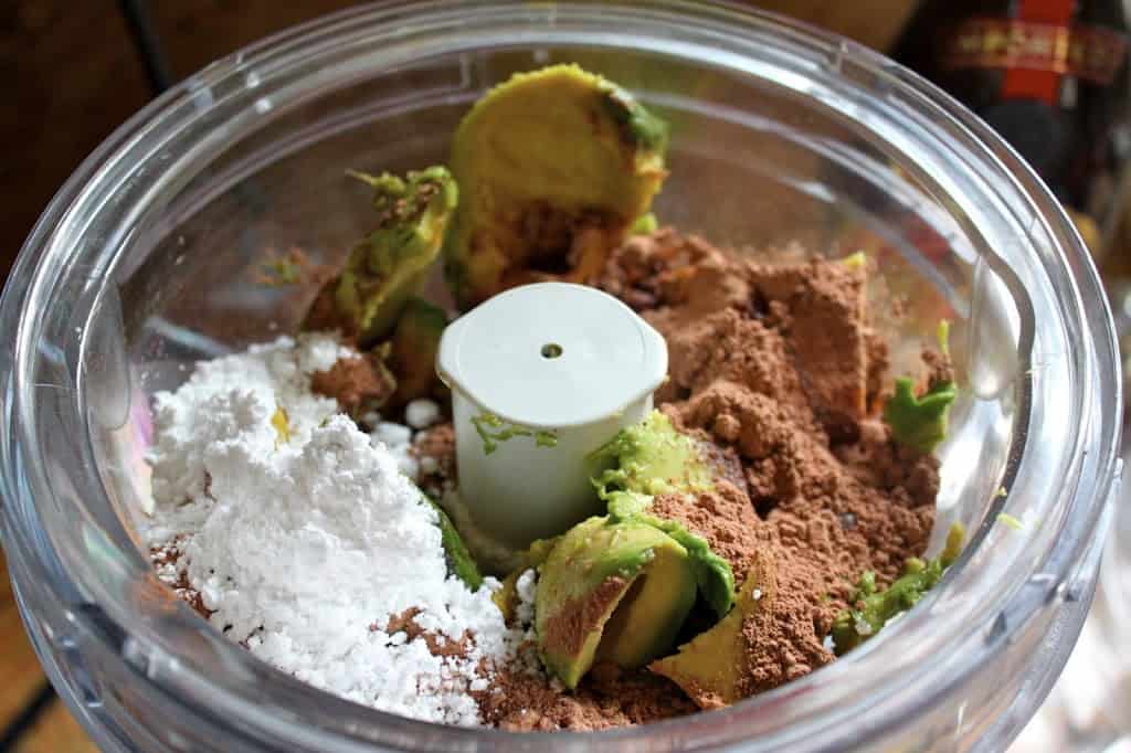 putting ingredients into food processor