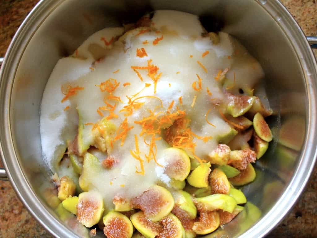 figs, sugar and citus peel in a pot