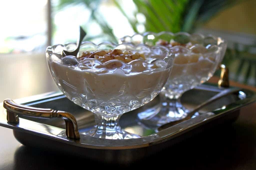 Creamy rice pudding on tray