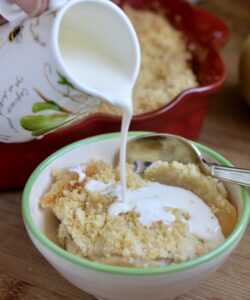 pouring cream onto dessert