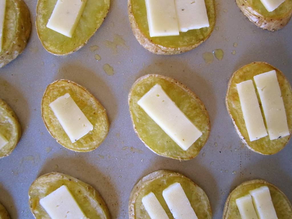 cheese on potato slices