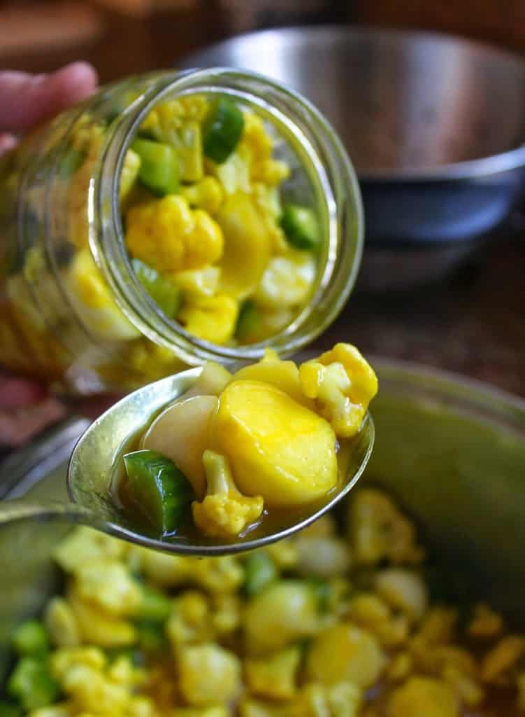 filling jar with piccalilli
