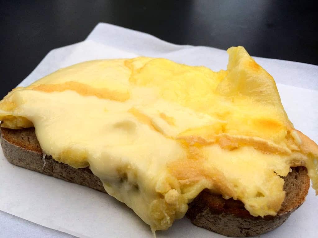 raclette on bread at Christmas Market in Cologne Germany