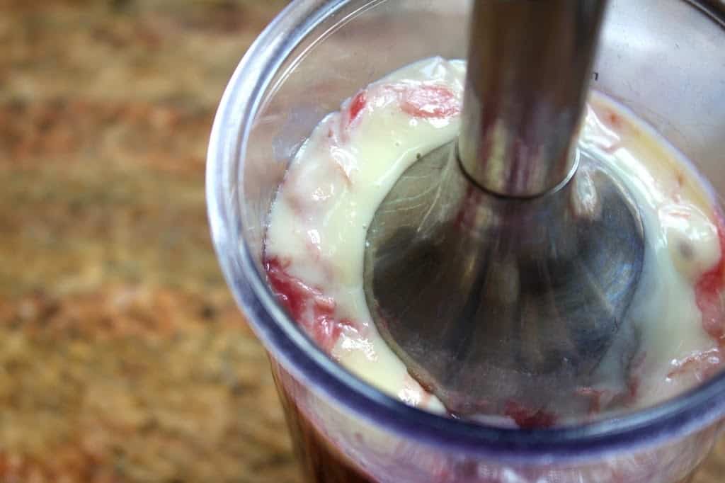 using an immersion blender to incorporate the condensed milk