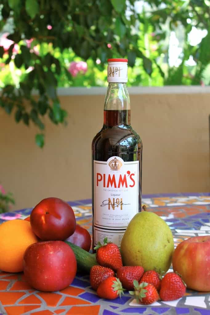 Pimm's Cup bottle surrounded by fruit
