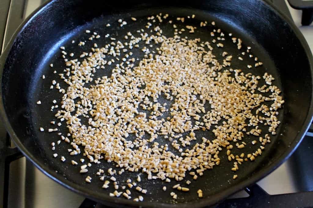 toasting oats in a cast iron pan