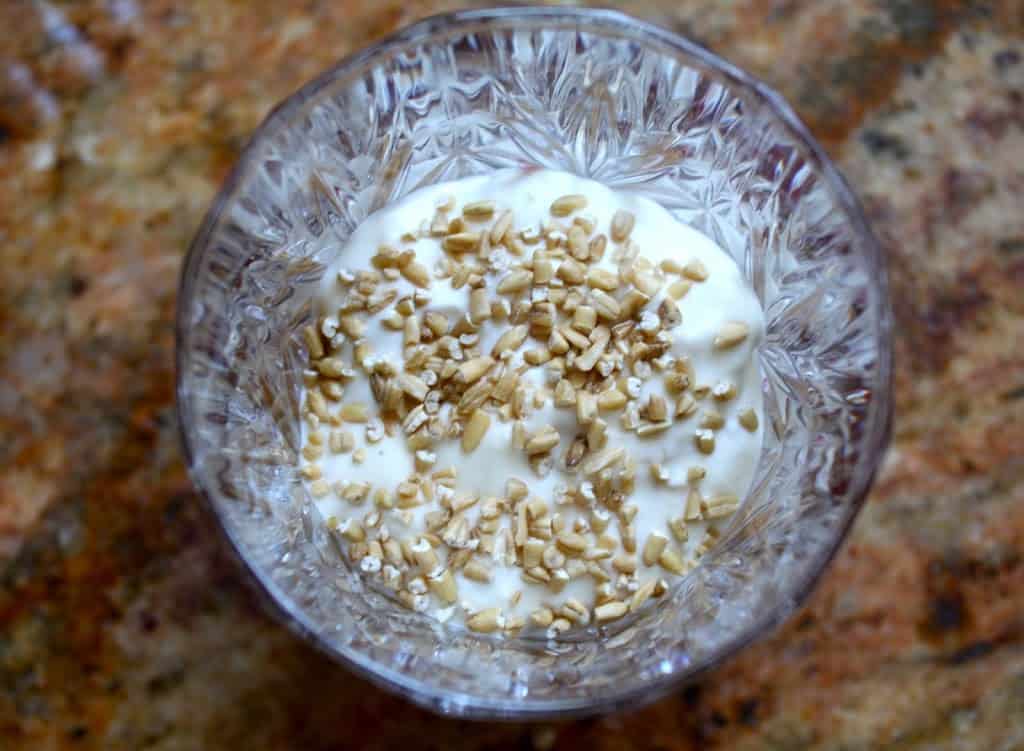 toasted oats on whisky cream in a crystal glass