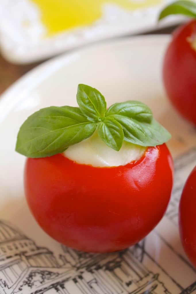 tomato and burrata appetizers on a plate