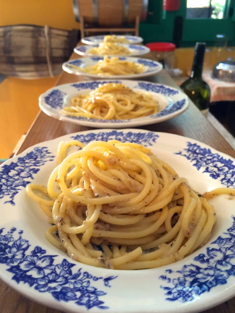 plates of cacio e pepe pasta