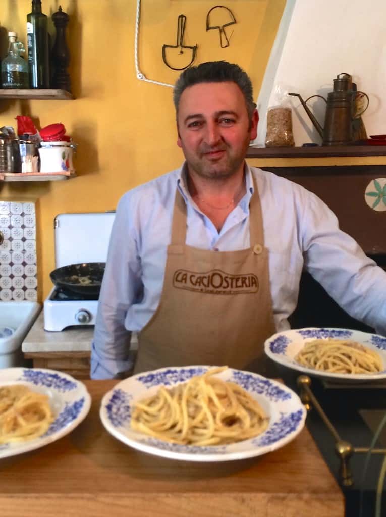 Loreto with plates of cacio e pepe pasta