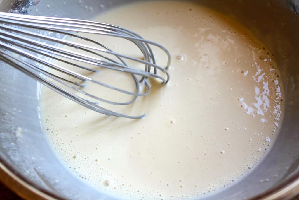 whisking the batter in a bowl