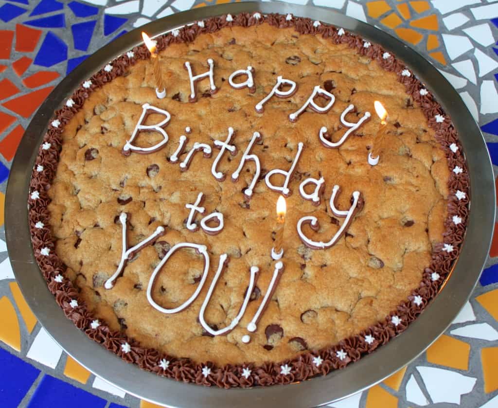Candles on chocolate chip cookie cake