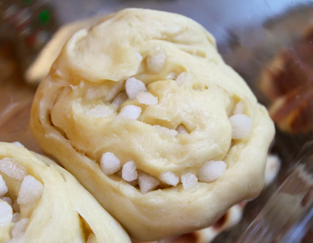 damp sugar pearls in dough