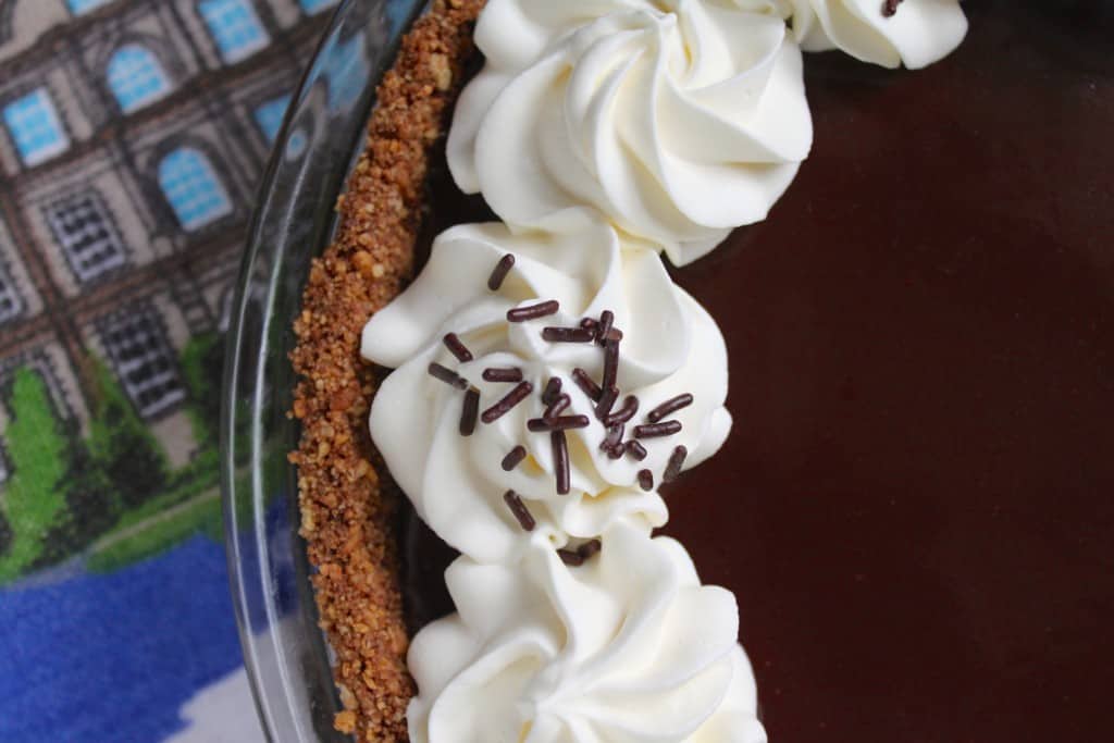 Cream and sprinkles on Chocolate Banoffee Pie