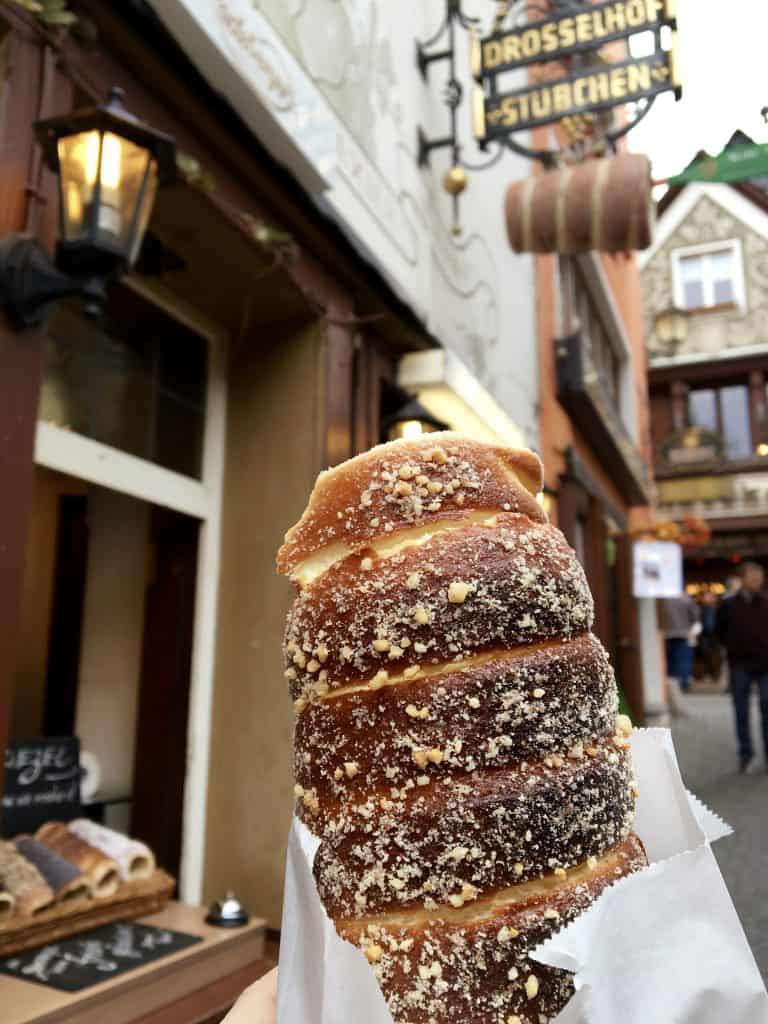Baumstriezel, or chimney cake in Rüdesheim, Germany while Cruising the Rhine Gorge with AmaWaterways