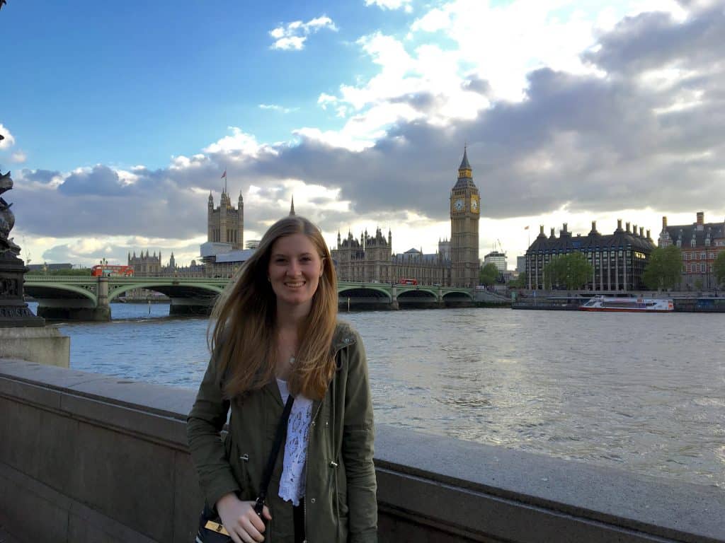 My daughter in front of the River Thames