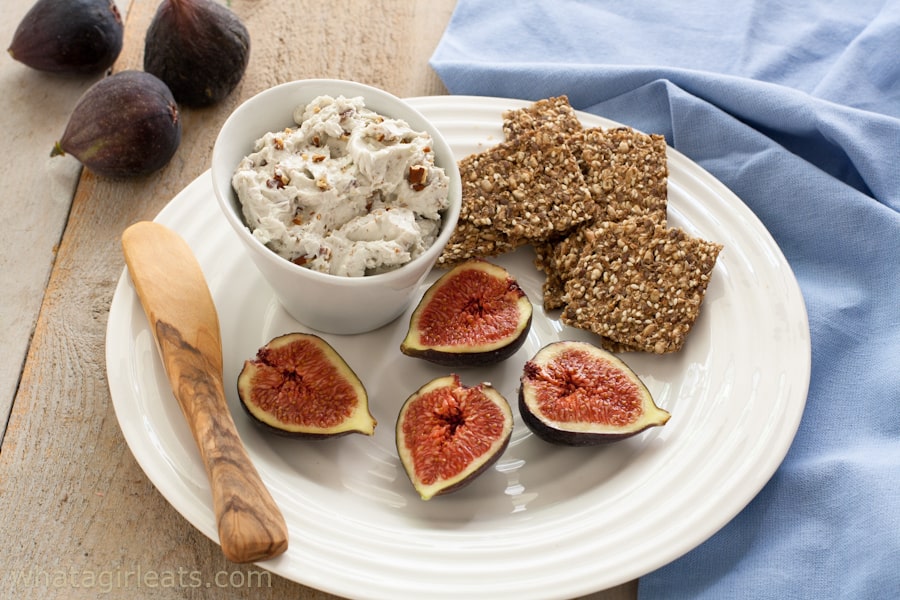 dip with figs and crackers on a plate