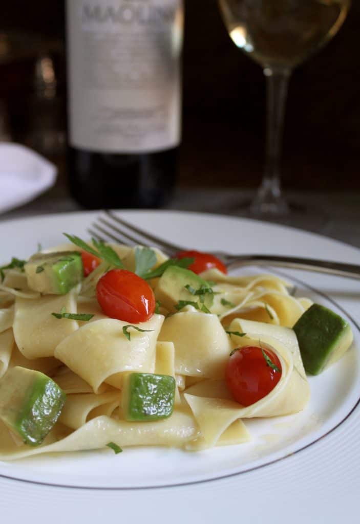 Egg pasta with avocado and cherry tomatoes