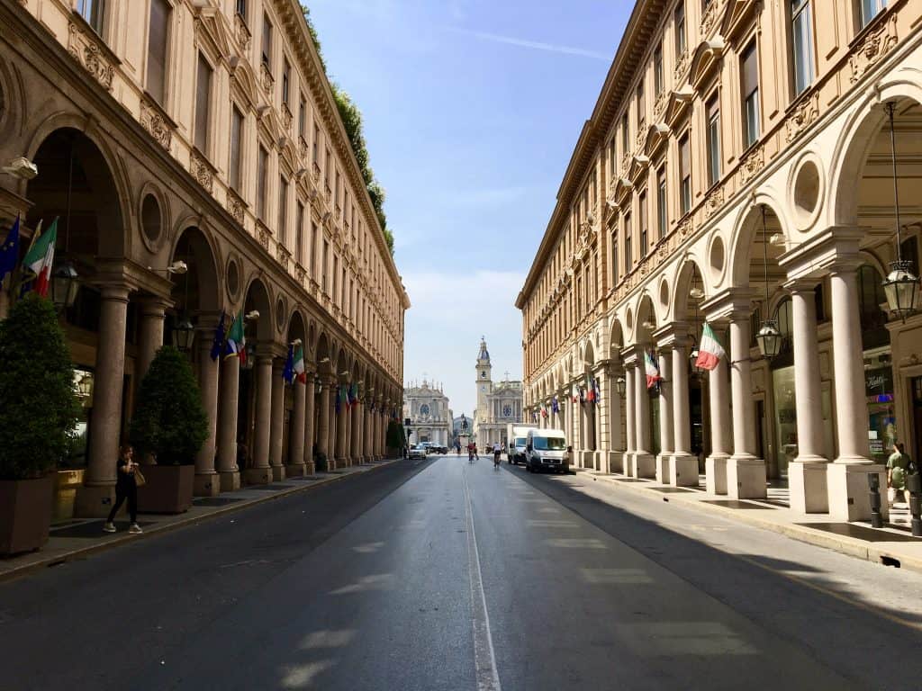 Turin street city center colonnades looking towards piazza san carlo on via roma
