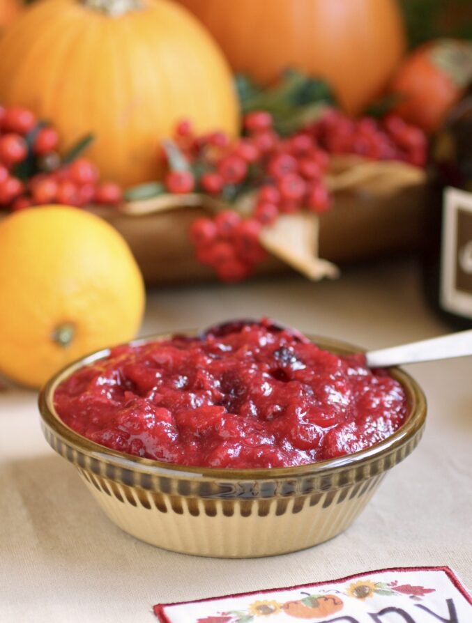 cranberry orange sauce with citrus in background