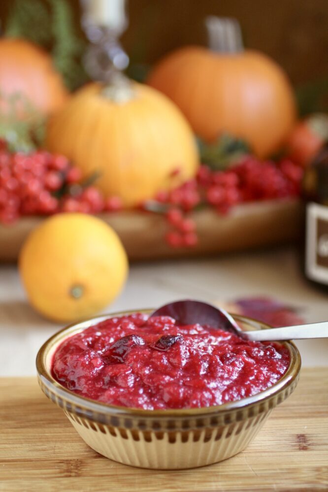 cranberry orange sauce with citrus in background