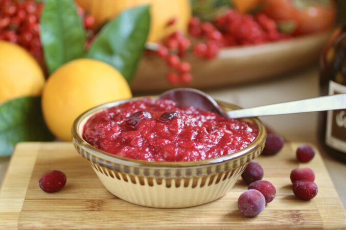 cranberry orange sauce with citrus in background