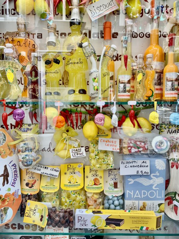 Limoncello products in a shop window in Naples