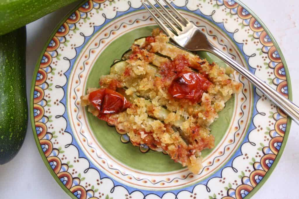 overhead baked zucchini on a plate