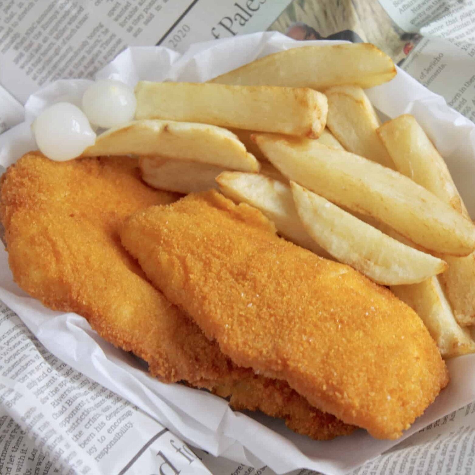 fish and chips on newspaper